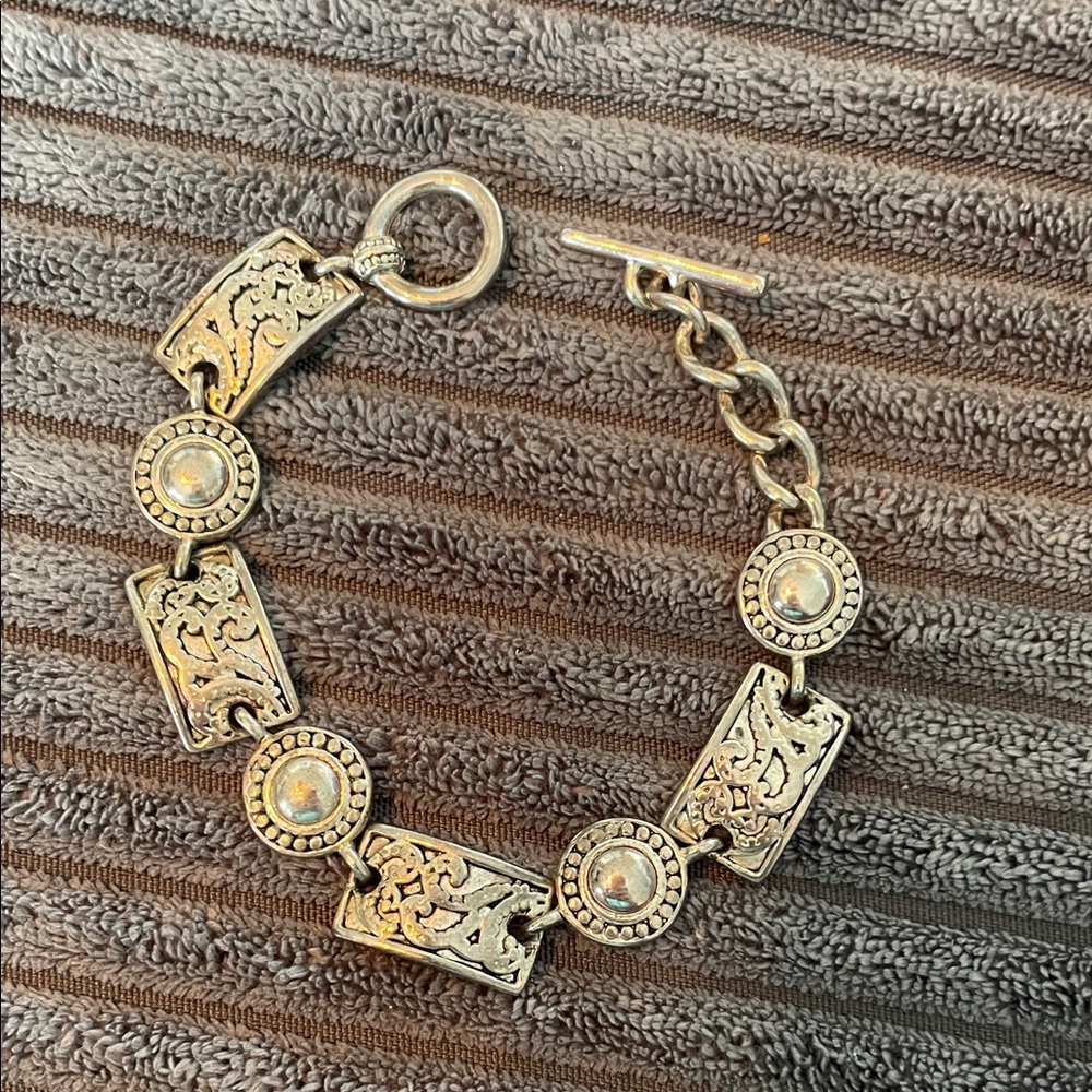 Elegant Silver Bracelet with Intricate Design